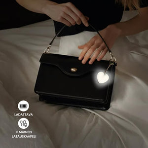 Kannettava kosketusherkkä valaistu avaimenperä